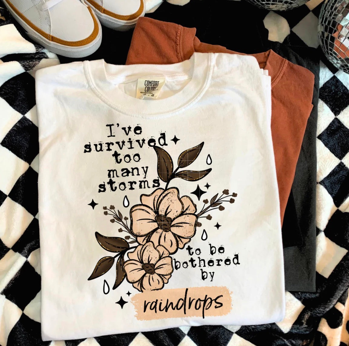 Survived too many storms graphic tee