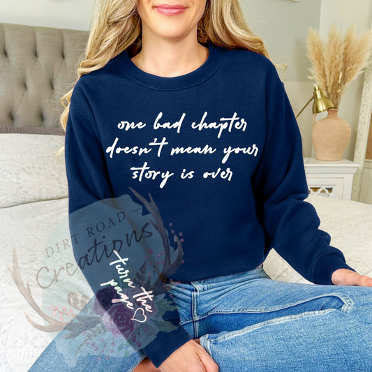 Turn the page screen print crewneck